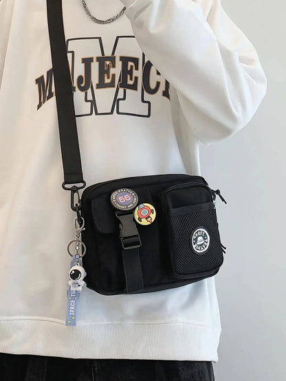 Unisex Casual Plain Color Release Buckle Crossbody Bag with Astronaut Charm, Zipper Crossbody Bag with Random Color Badge, Aesthetic Shoulder Bag, Zippered Sling Bag, Casual Crossbody Bags